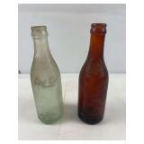 2 Vintage embossed Coca Cola Lexington Ky glass bottles
