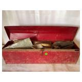 Red metal tool box with hand tools