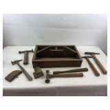 Vintage wooden box with body hammers