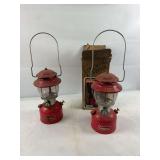 2 Coleman Lanterns red in color