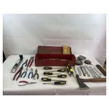 Red metal toolbox with tools