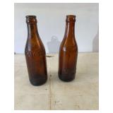 2 vintage Coca-Cola bottles
