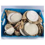 Tote of cups and saucers