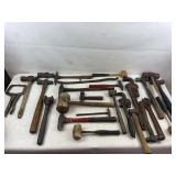Assortment of hammers and wrenches