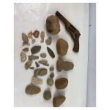 Vintage Indian rocks and Wood gun