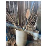 White barrel of lawn and garden tools