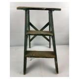 Green wooden step ladder