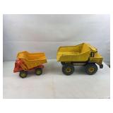 2 Vintage dump trucks