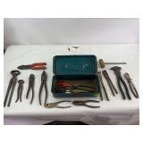 Green metal tool box with tools