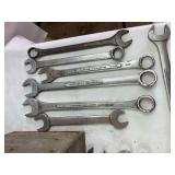 Metal toolbox with Craftsman wrenches