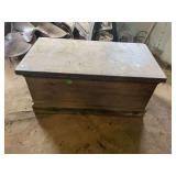 Wooden trunk with contents