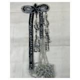 Black Ribbon Ornament With Beaded Design