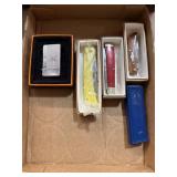 Knives, Harmonica, and Lighter