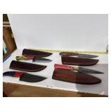 4 Hunting Knives With Sheathes