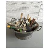 Used Paint Brushes in Metal Tub