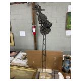 Metal Sculpture On Stone Base