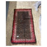 Woven Brown and Red Patterned Rug