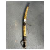 Curved Sword With Scabbard and Lion Motif