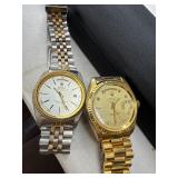 Two Replica Rolex Watches, One Damaged