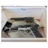 Two Toy Pistols