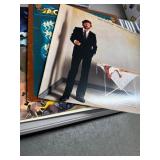 8 Vinyl Records with Various Titles