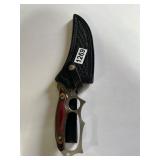 Knife With Sheath by Jim Frost