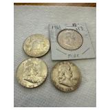 Four Franklin Half Dollar Coins