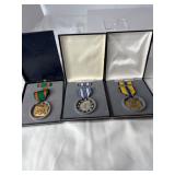 Three Military Medals in Cases