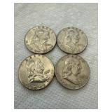 Four Franklin Half Dollar Coins