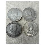 Four Franklin Half Dollar Coins