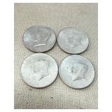 Four 1964 Kennedy Half Dollars