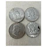 Four Franklin Half Dollars