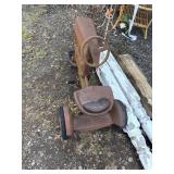 Rusty Pedal Tractor with Steering Wheel