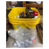 Golf Balls in Yellow Bucket