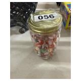 Glass Jar Filled With Colorful Marbles