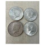 Four 1964 Kennedy Half Dollars