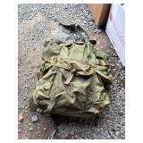Military-Style Green Backpack With Contents