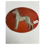 Cast Iron Plaque of a Dog in Relief