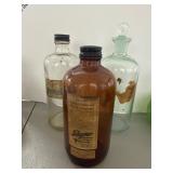 Three Vintage Apothecary Bottles