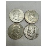 Four Franklin Half Dollars