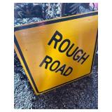 Yellow Wooden Rough Road Sign