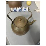 Three Brass Teapots With Ceramic Handles