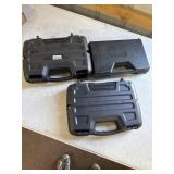 Three Plastic Pistol Carrying Cases
