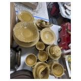 Large Lot Embossed Yellow Ceramic Dinnerware Set