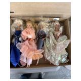 4 Barbie Dolls with Outfits and Basket