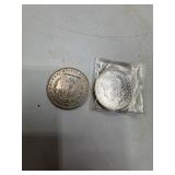 Two Morgan Silver Dollars, 1878 & 1900