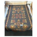 Handwoven Wool Rug With Geometric Patterns