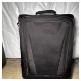 TravelPro Black Fabric Rolling Upright Suitcase...