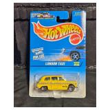 1996 Hot Wheels #619 London Taxi Yellow