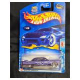 2003 Hot Wheels #148 '57 Cadillac Eldorado Purple